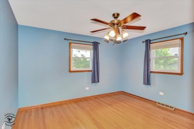 Tucked away on a peaceful, tree-lined street in coveted North on Downers Grove Golf Club in Illinois - for sale on GolfHomes.com, golf home, golf lot