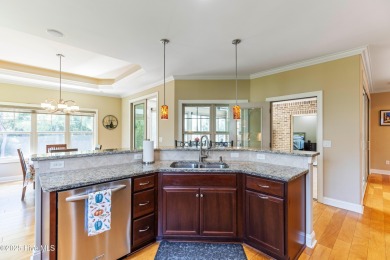 At 3220 Moss Hammock Wynd, craftsmanship and prestige unite in on Members Club At St. James Plantation in North Carolina - for sale on GolfHomes.com, golf home, golf lot