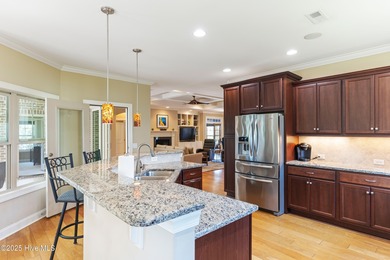 At 3220 Moss Hammock Wynd, craftsmanship and prestige unite in on Members Club At St. James Plantation in North Carolina - for sale on GolfHomes.com, golf home, golf lot