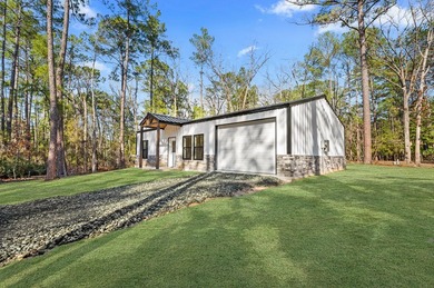Discover modern East Texas living in this newly constructed on Rayburn Country Club in Texas - for sale on GolfHomes.com, golf home, golf lot