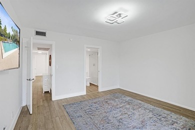 Discover this stunning top-floor 2-bed, 2-bath condo in the on Wynmoor Golf Course in Florida - for sale on GolfHomes.com, golf home, golf lot