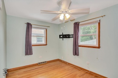 Tucked away on a peaceful, tree-lined street in coveted North on Downers Grove Golf Club in Illinois - for sale on GolfHomes.com, golf home, golf lot