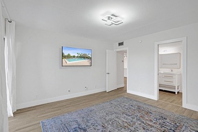 Discover this stunning top-floor 2-bed, 2-bath condo in the on Wynmoor Golf Course in Florida - for sale on GolfHomes.com, golf home, golf lot