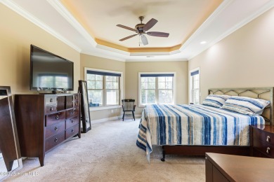 At 3220 Moss Hammock Wynd, craftsmanship and prestige unite in on Members Club At St. James Plantation in North Carolina - for sale on GolfHomes.com, golf home, golf lot