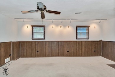 Tucked away on a peaceful, tree-lined street in coveted North on Downers Grove Golf Club in Illinois - for sale on GolfHomes.com, golf home, golf lot