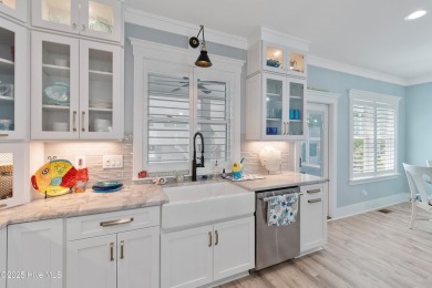 Charming Sunset Beach House custom built in 2023 is simply on Oyster Bay Golf Links in North Carolina - for sale on GolfHomes.com, golf home, golf lot