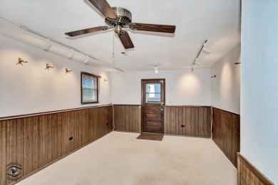 Tucked away on a peaceful, tree-lined street in coveted North on Downers Grove Golf Club in Illinois - for sale on GolfHomes.com, golf home, golf lot