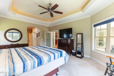 At 3220 Moss Hammock Wynd, craftsmanship and prestige unite in on Members Club At St. James Plantation in North Carolina - for sale on GolfHomes.com, golf home, golf lot