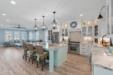 Charming Sunset Beach House custom built in 2023 is simply on Oyster Bay Golf Links in North Carolina - for sale on GolfHomes.com, golf home, golf lot
