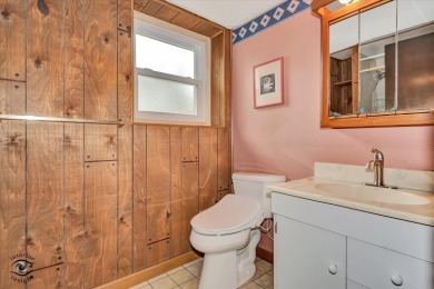 Tucked away on a peaceful, tree-lined street in coveted North on Downers Grove Golf Club in Illinois - for sale on GolfHomes.com, golf home, golf lot