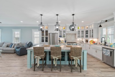 Charming Sunset Beach House custom built in 2023 is simply on Oyster Bay Golf Links in North Carolina - for sale on GolfHomes.com, golf home, golf lot