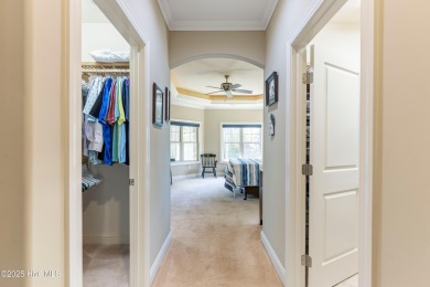 At 3220 Moss Hammock Wynd, craftsmanship and prestige unite in on Members Club At St. James Plantation in North Carolina - for sale on GolfHomes.com, golf home, golf lot