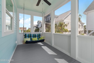 Charming Sunset Beach House custom built in 2023 is simply on Oyster Bay Golf Links in North Carolina - for sale on GolfHomes.com, golf home, golf lot