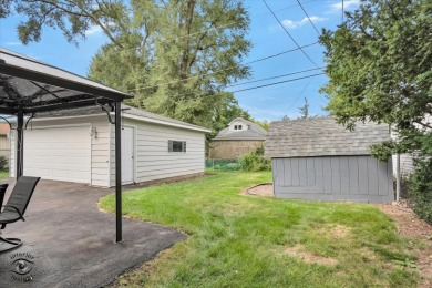 Tucked away on a peaceful, tree-lined street in coveted North on Downers Grove Golf Club in Illinois - for sale on GolfHomes.com, golf home, golf lot