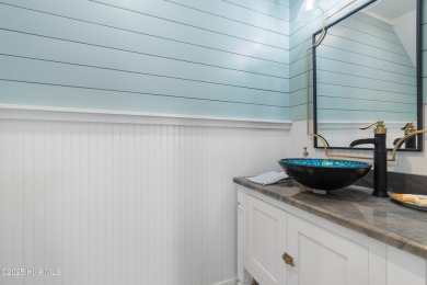 Charming Sunset Beach House custom built in 2023 is simply on Oyster Bay Golf Links in North Carolina - for sale on GolfHomes.com, golf home, golf lot