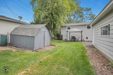 Tucked away on a peaceful, tree-lined street in coveted North on Downers Grove Golf Club in Illinois - for sale on GolfHomes.com, golf home, golf lot