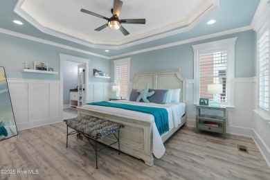 Charming Sunset Beach House custom built in 2023 is simply on Oyster Bay Golf Links in North Carolina - for sale on GolfHomes.com, golf home, golf lot