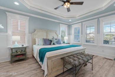 Charming Sunset Beach House custom built in 2023 is simply on Oyster Bay Golf Links in North Carolina - for sale on GolfHomes.com, golf home, golf lot