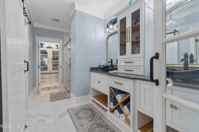 Charming Sunset Beach House custom built in 2023 is simply on Oyster Bay Golf Links in North Carolina - for sale on GolfHomes.com, golf home, golf lot