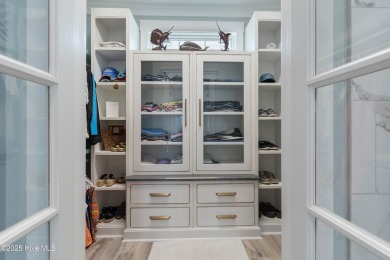Charming Sunset Beach House custom built in 2023 is simply on Oyster Bay Golf Links in North Carolina - for sale on GolfHomes.com, golf home, golf lot