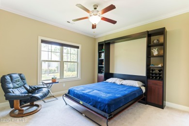At 3220 Moss Hammock Wynd, craftsmanship and prestige unite in on Members Club At St. James Plantation in North Carolina - for sale on GolfHomes.com, golf home, golf lot