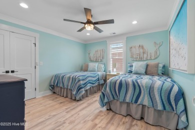 Charming Sunset Beach House custom built in 2023 is simply on Oyster Bay Golf Links in North Carolina - for sale on GolfHomes.com, golf home, golf lot