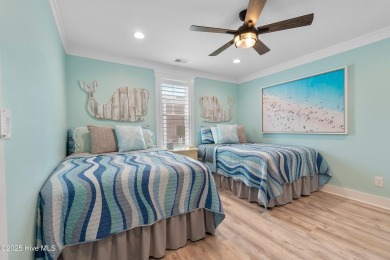 Charming Sunset Beach House custom built in 2023 is simply on Oyster Bay Golf Links in North Carolina - for sale on GolfHomes.com, golf home, golf lot