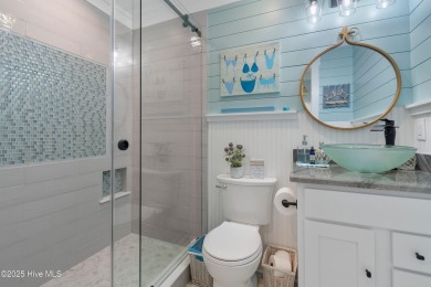 Charming Sunset Beach House custom built in 2023 is simply on Oyster Bay Golf Links in North Carolina - for sale on GolfHomes.com, golf home, golf lot