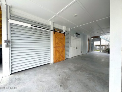 Charming Sunset Beach House custom built in 2023 is simply on Oyster Bay Golf Links in North Carolina - for sale on GolfHomes.com, golf home, golf lot