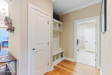 At 3220 Moss Hammock Wynd, craftsmanship and prestige unite in on Members Club At St. James Plantation in North Carolina - for sale on GolfHomes.com, golf home, golf lot