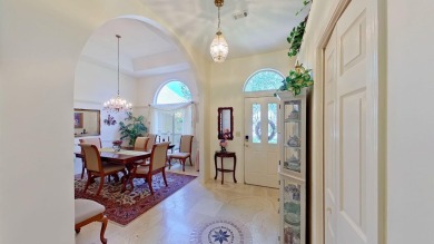 Nestled on the 3rd tee box, this beautifully designed 3-bedroom on Shalimar Pointe Golf and Country Club in Florida - for sale on GolfHomes.com, golf home, golf lot