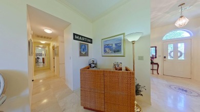 Nestled on the 3rd tee box, this beautifully designed 3-bedroom on Shalimar Pointe Golf and Country Club in Florida - for sale on GolfHomes.com, golf home, golf lot