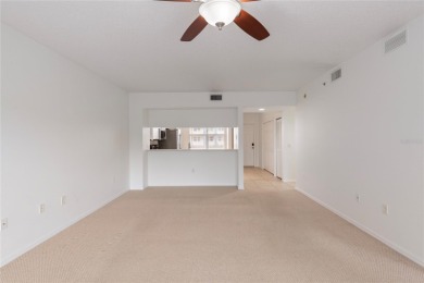 Welcome to this  beautifully maintained 2-bedroom, 2-bath on East Bay Golf Club in Florida - for sale on GolfHomes.com, golf home, golf lot