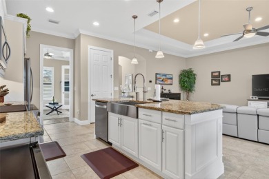 This isn't your average WCI Florencia model and it's priced to on Venetian Golf and River Club in Florida - for sale on GolfHomes.com, golf home, golf lot