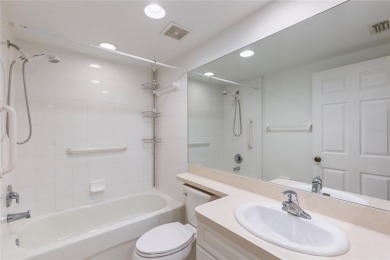 Welcome to this  beautifully maintained 2-bedroom, 2-bath on East Bay Golf Club in Florida - for sale on GolfHomes.com, golf home, golf lot