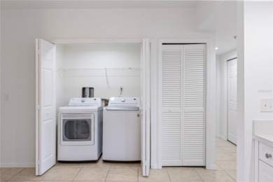 Welcome to this  beautifully maintained 2-bedroom, 2-bath on East Bay Golf Club in Florida - for sale on GolfHomes.com, golf home, golf lot