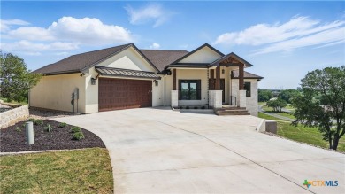 This stunning new build with exceptional views is located on the on The Bandit Golf Club in Texas - for sale on GolfHomes.com, golf home, golf lot