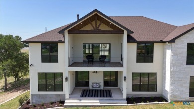 This stunning new build with exceptional views is located on the on The Bandit Golf Club in Texas - for sale on GolfHomes.com, golf home, golf lot