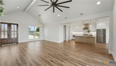 This stunning new build with exceptional views is located on the on The Bandit Golf Club in Texas - for sale on GolfHomes.com, golf home, golf lot