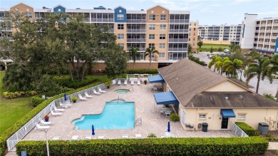 Welcome to this  beautifully maintained 2-bedroom, 2-bath on East Bay Golf Club in Florida - for sale on GolfHomes.com, golf home, golf lot