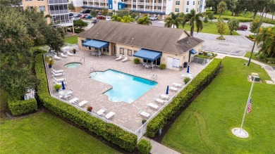 Welcome to this  beautifully maintained 2-bedroom, 2-bath on East Bay Golf Club in Florida - for sale on GolfHomes.com, golf home, golf lot