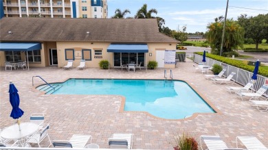 Welcome to this  beautifully maintained 2-bedroom, 2-bath on East Bay Golf Club in Florida - for sale on GolfHomes.com, golf home, golf lot