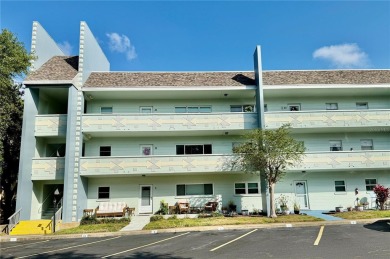 This 1400 sq ft 2 bedroom two bath unit is only a block away on On Top Of The World Golf Course in Florida - for sale on GolfHomes.com, golf home, golf lot