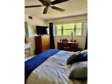 This 1400 sq ft 2 bedroom two bath unit is only a block away on On Top Of The World Golf Course in Florida - for sale on GolfHomes.com, golf home, golf lot
