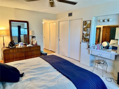 This 1400 sq ft 2 bedroom two bath unit is only a block away on On Top Of The World Golf Course in Florida - for sale on GolfHomes.com, golf home, golf lot