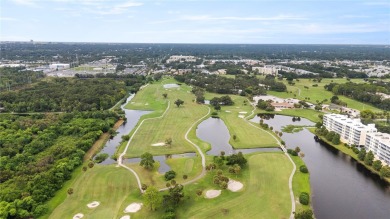 Welcome to this  beautifully maintained 2-bedroom, 2-bath on East Bay Golf Club in Florida - for sale on GolfHomes.com, golf home, golf lot