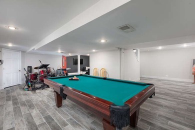 Welcome to this exquisite home nestled down a tree-lined street on White Eagle Golf Club in Illinois - for sale on GolfHomes.com, golf home, golf lot