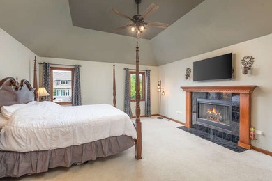 Welcome to this exquisite home nestled down a tree-lined street on White Eagle Golf Club in Illinois - for sale on GolfHomes.com, golf home, golf lot