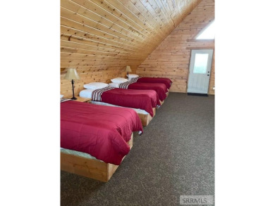 Beautiful cabin in the Island Park Village subdivision! Near the on Island Park Village Resort Golf Course in Idaho - for sale on GolfHomes.com, golf home, golf lot