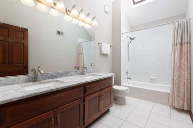 Welcome to this exquisite home nestled down a tree-lined street on White Eagle Golf Club in Illinois - for sale on GolfHomes.com, golf home, golf lot